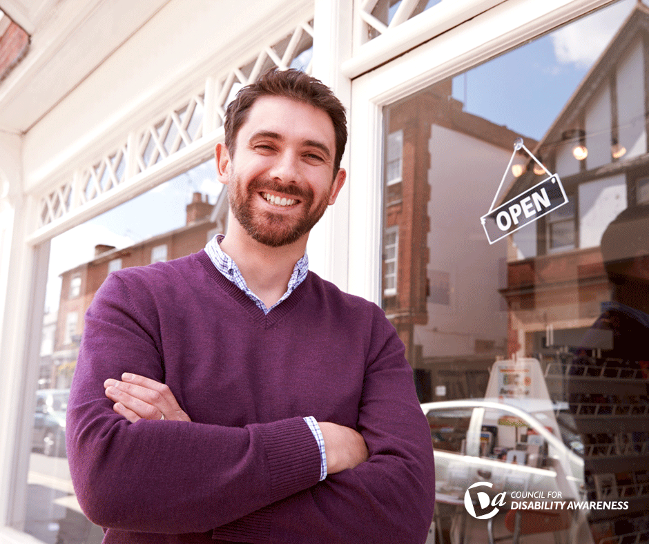 Business owner outside his shopfront.