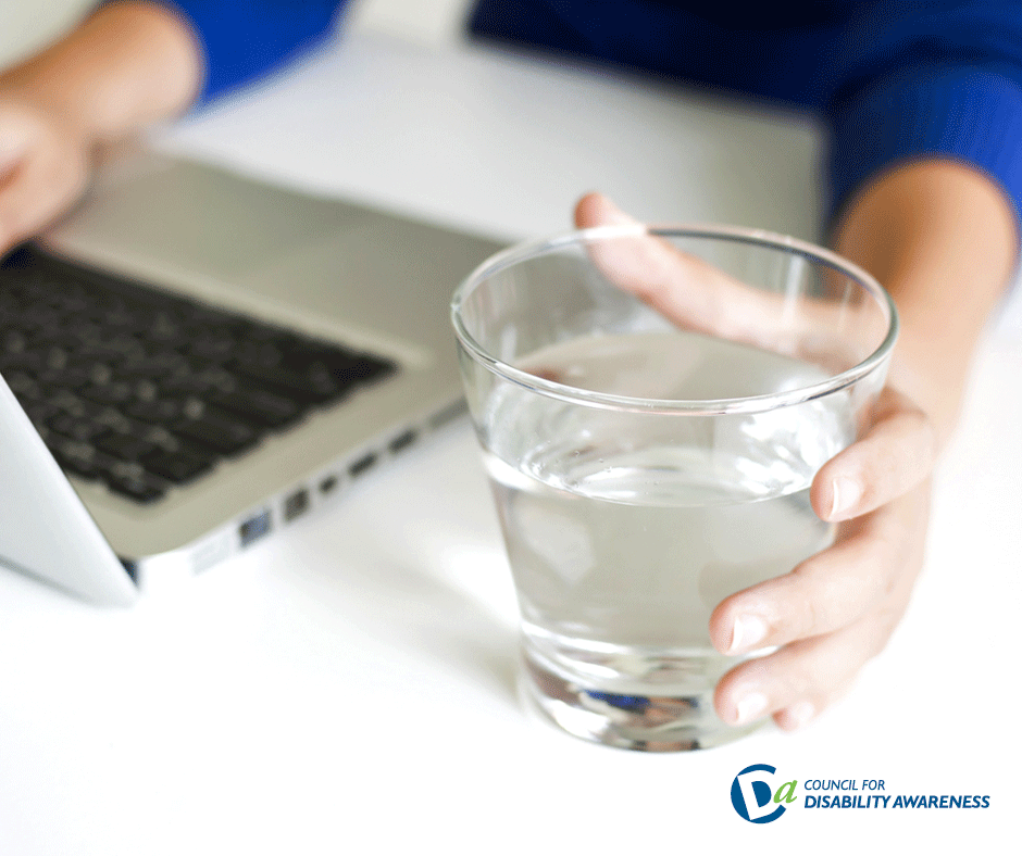 Glass of water at a desk