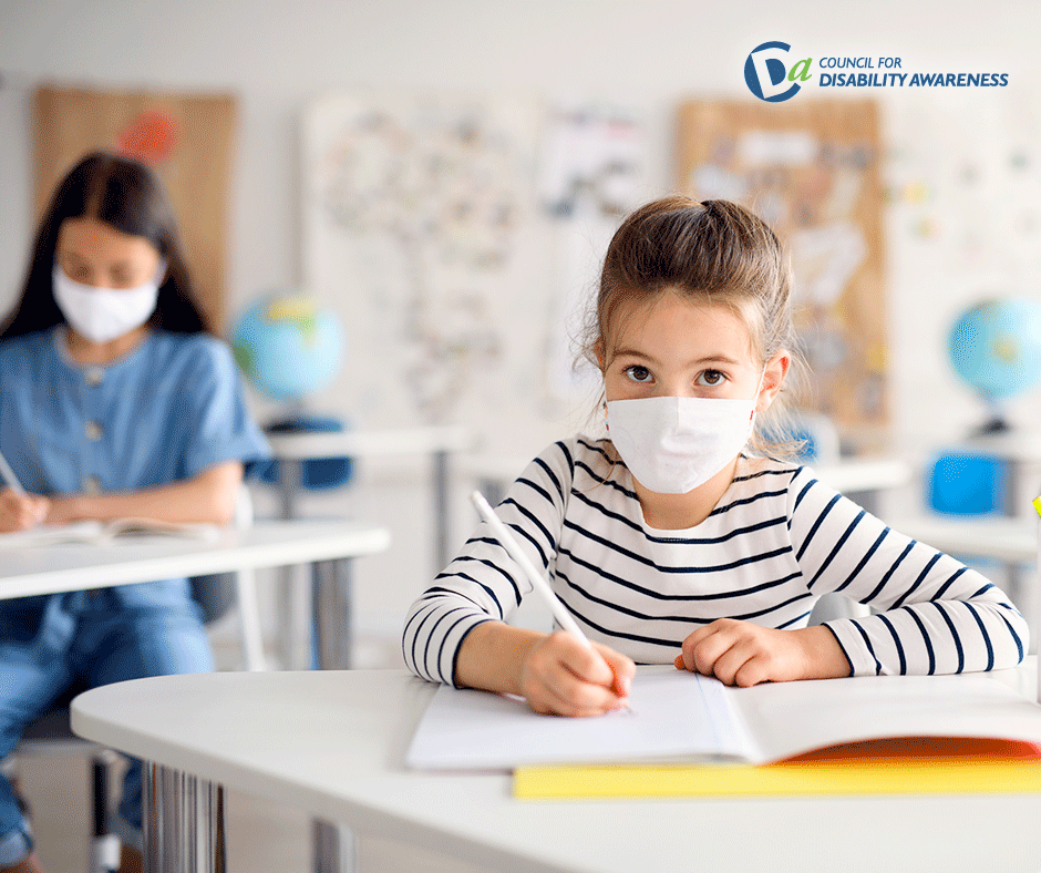 School children in class wearing face masks