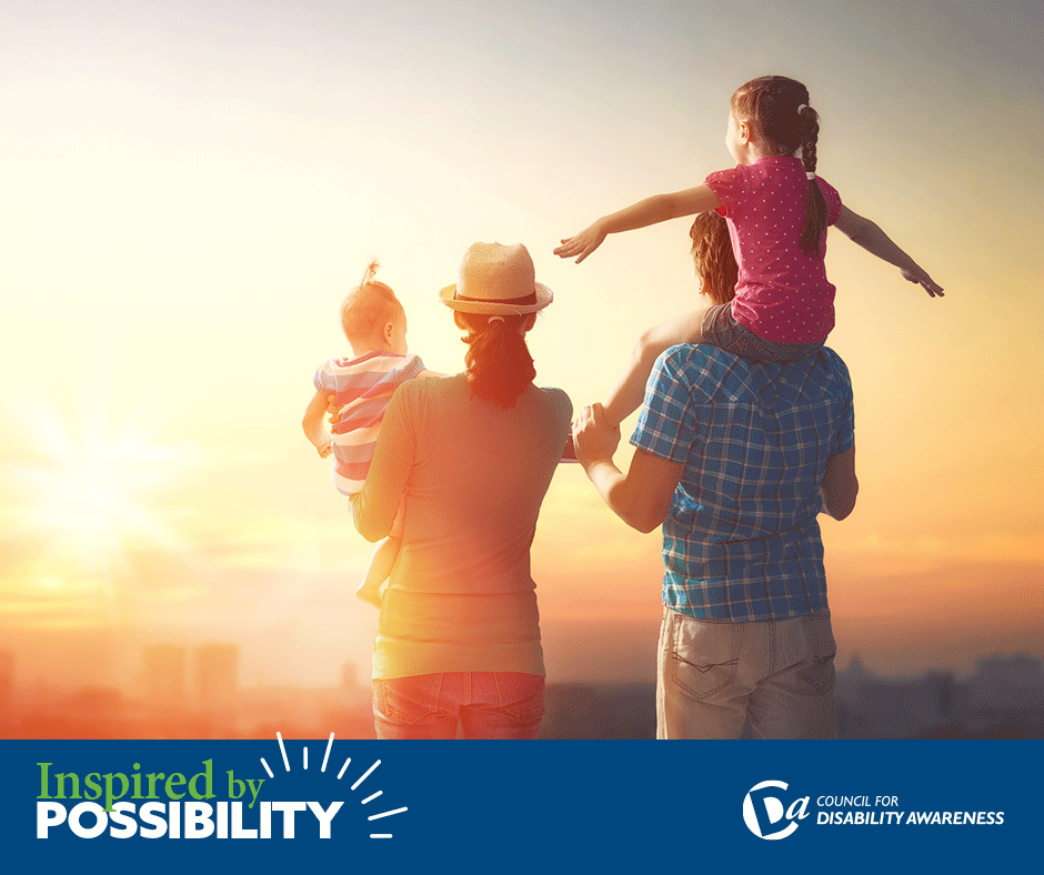 Family looking off into a bright sunset