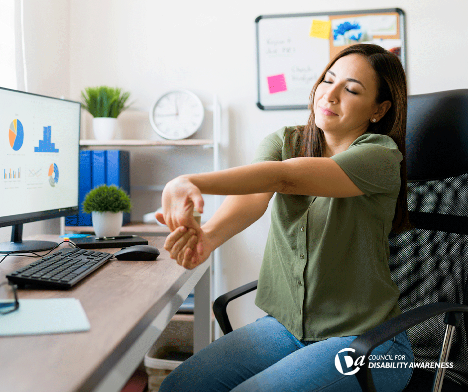 Professional woman stretching at her desk