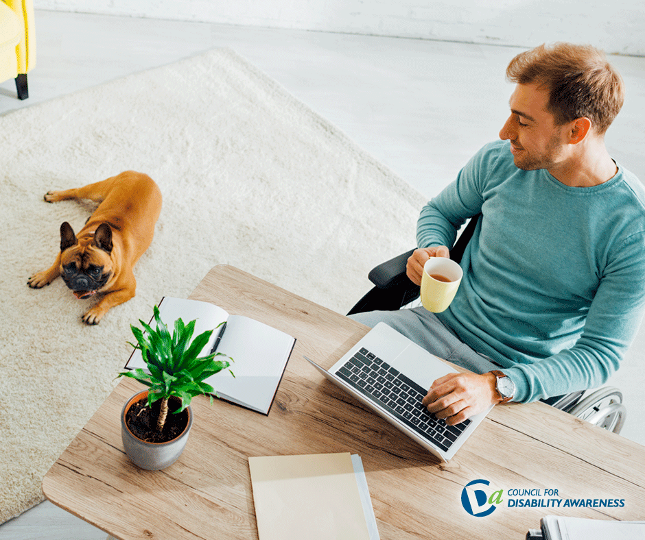 Remote worker in wheelchair, gazing at his French bulldog, in living room