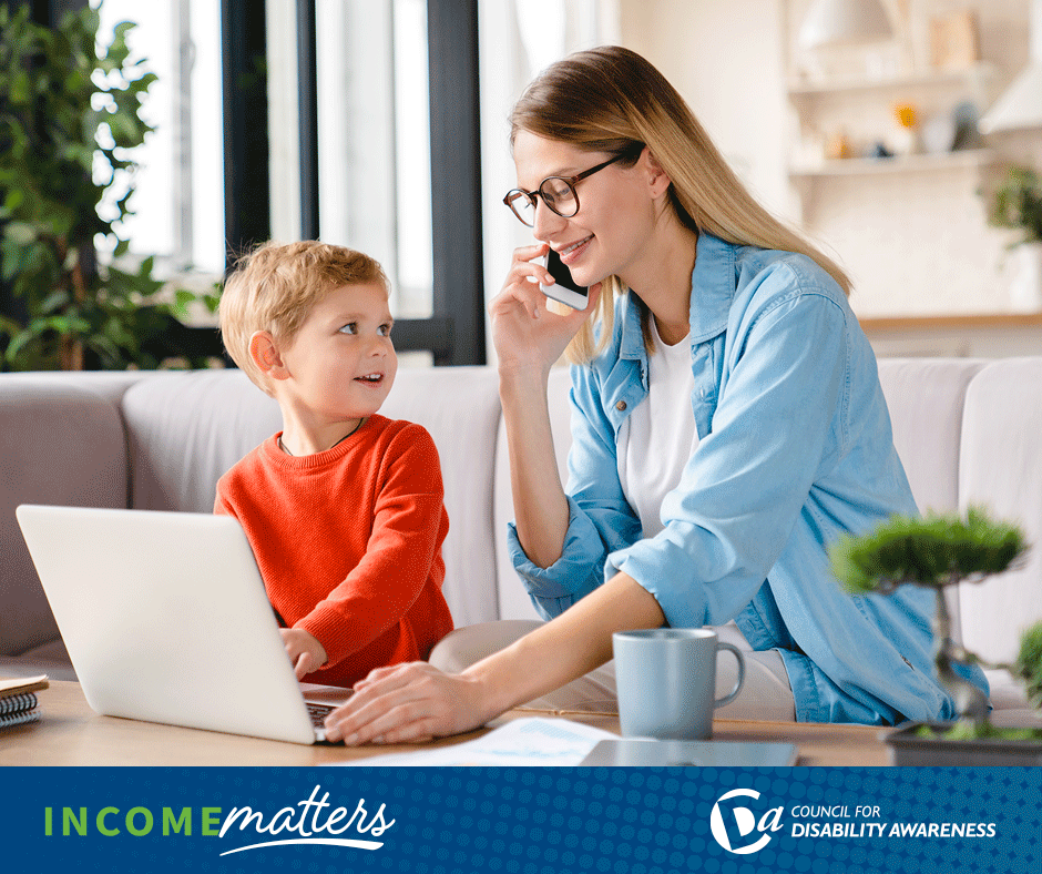 Young professional woman with child, working from home on laptop and phone. Income Matters.