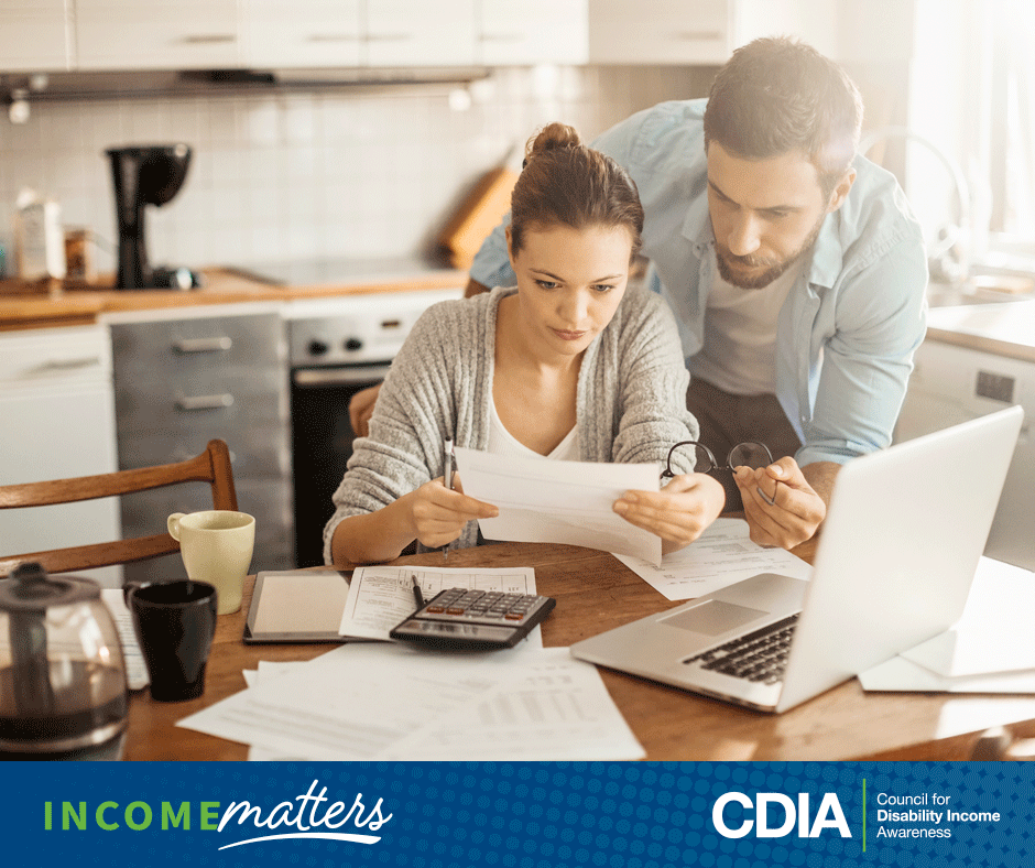 Open enrollment 2024, Income Matters/CDIA. Working couple managing bills.