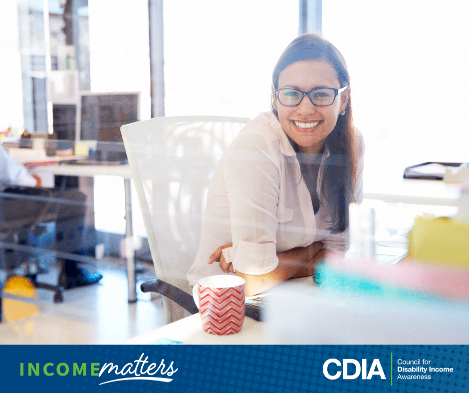 Income Matters, CDIA. Employee happy at work in the office.